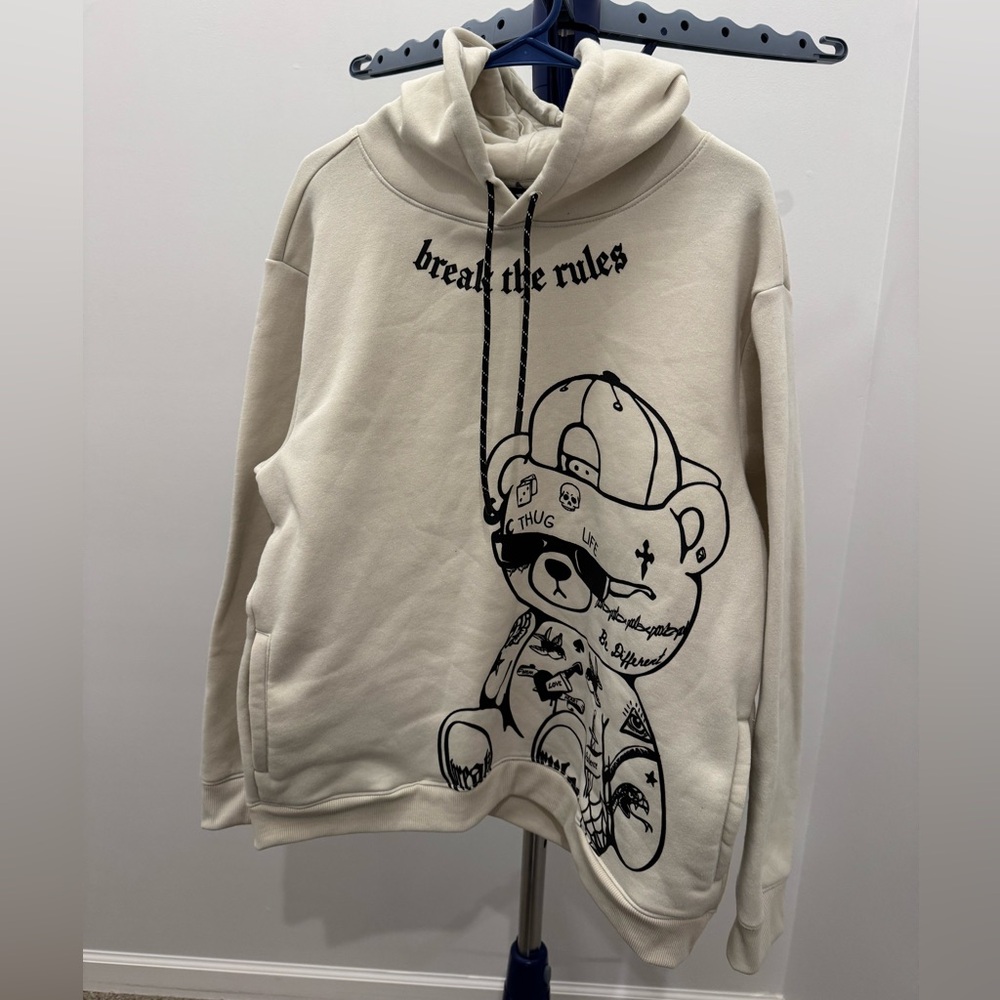 RGSTR Beige hoodie with print of tattooed bear w/text “break the rules” Size L